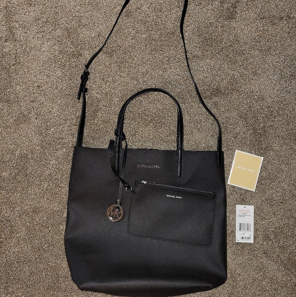 Michael Kors Handbags - Nwt Michael Kors large bag with matching clutch